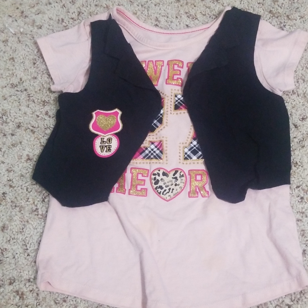 A kids shirt and vest